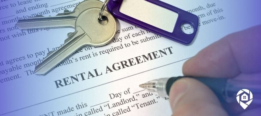 Veteran signing a rental agreement after using a VA loan to invest in real estate.