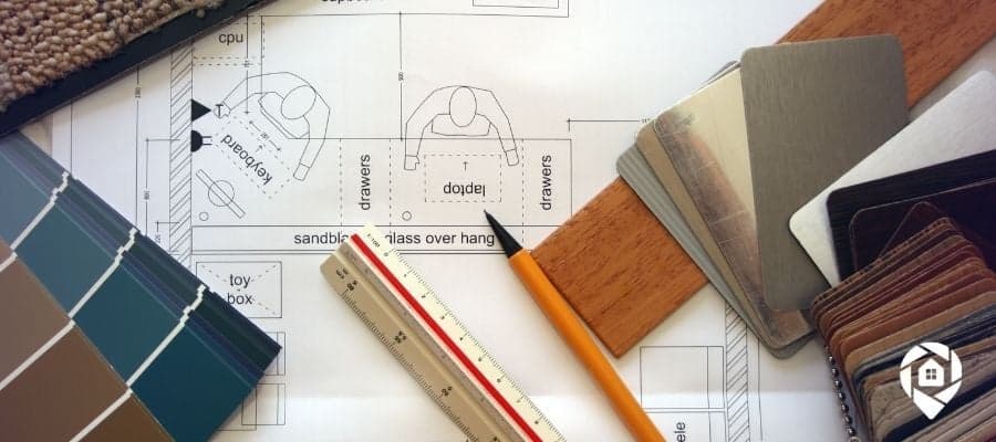 Real estate renovation planning with design samples and materials—representing property flipping strategies.