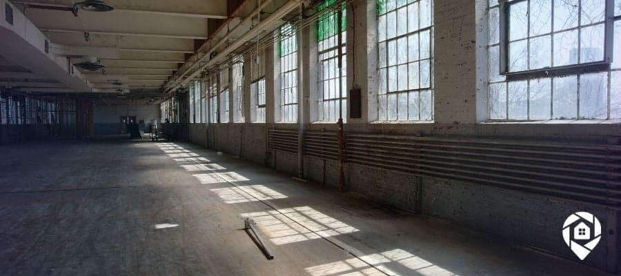 Vacant commercial building interior before redevelopment into a small business center.
