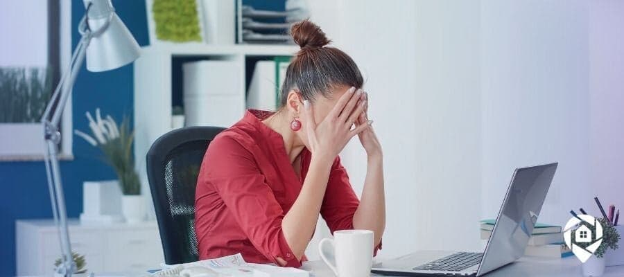 Frustrated real estate investor stressed over partnership issues.